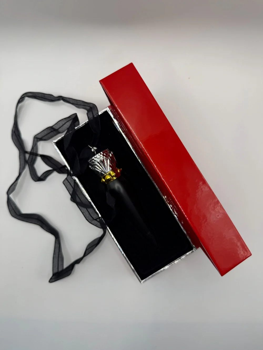 Christian Louboutin Velvet Matte Lip Colour Jackie 002M in Deep Red